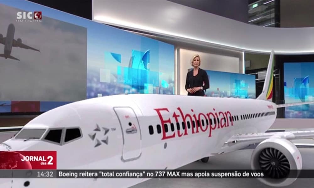 Female news anchor in studio behind a large AR graphic of a jet plane