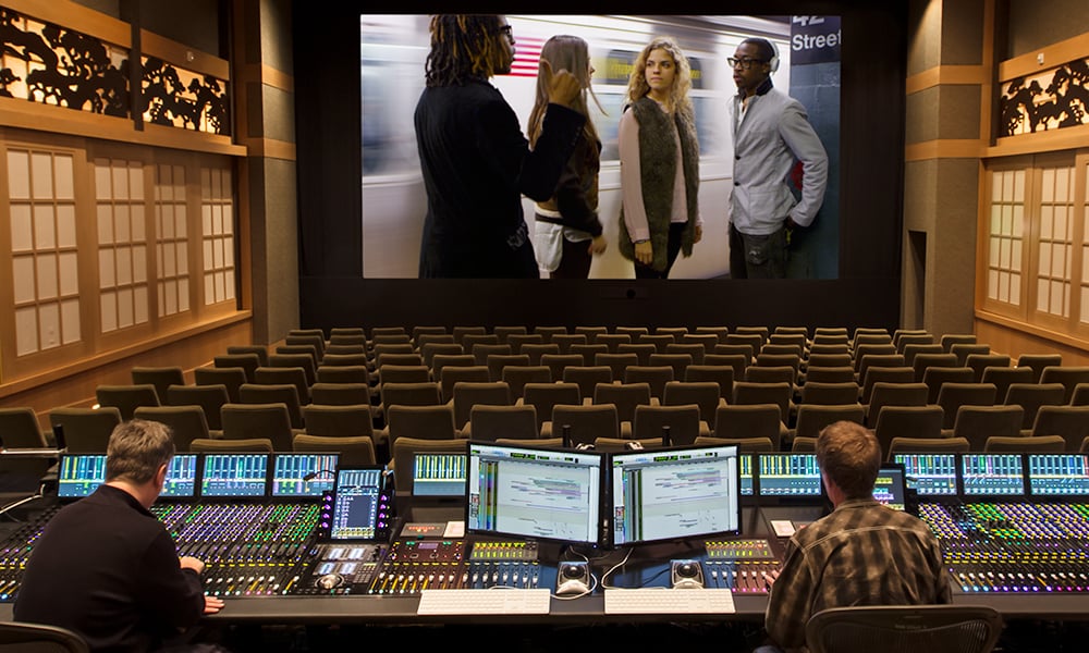 Small auditorium with audio post production setup at the back