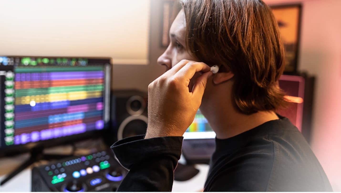  MBOX Studio audio interface in personal studio connected to AirPods