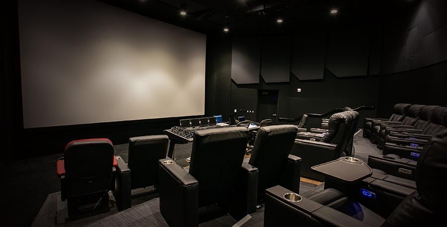 Image of expansive mixing theatre with Dolby Atmos and Pro Tools workstation