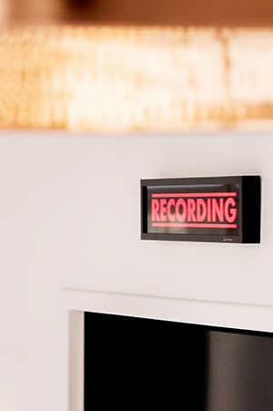 recording sign over door in Saya Post Production office