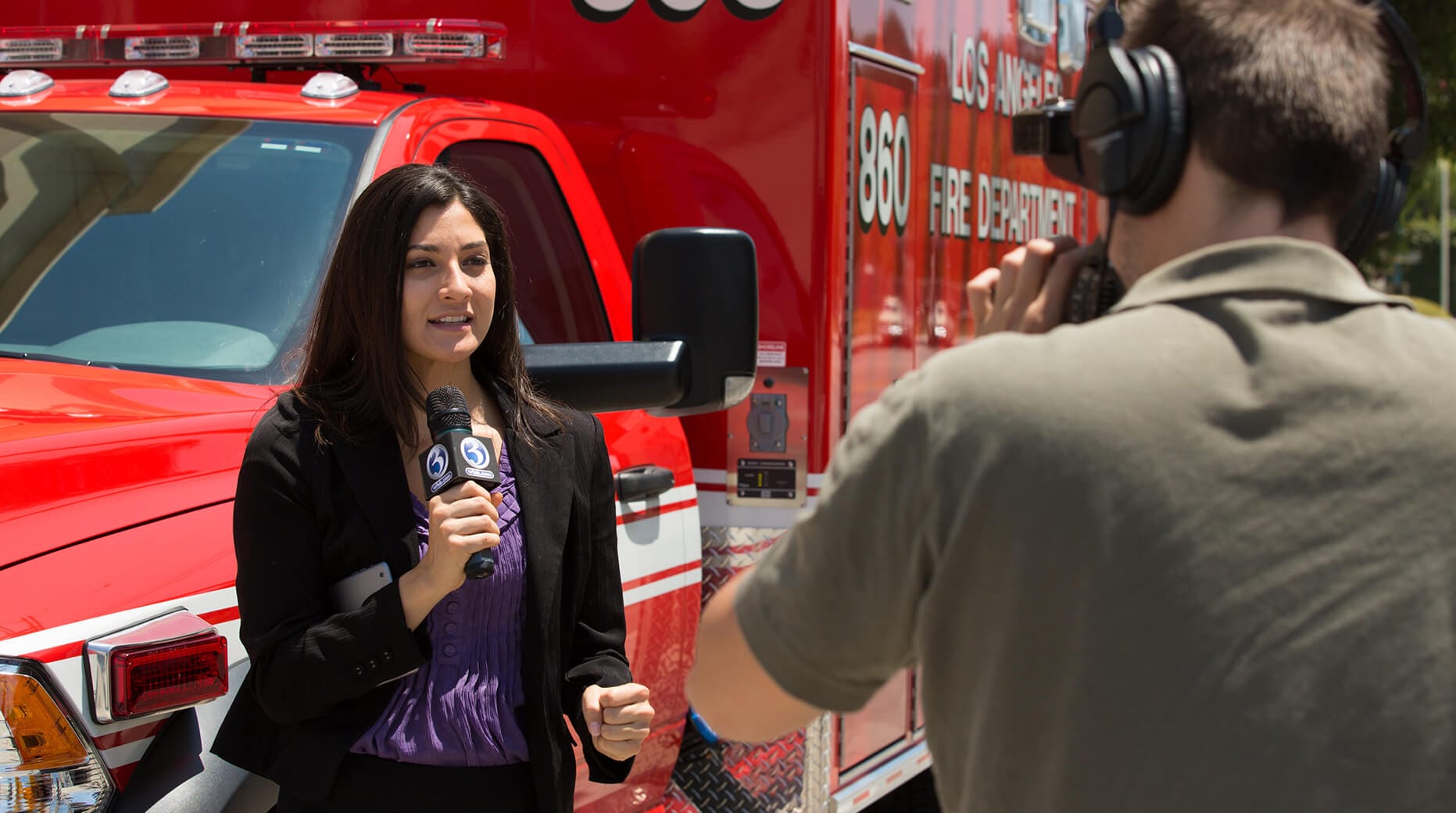 reporter and cameraman in the field