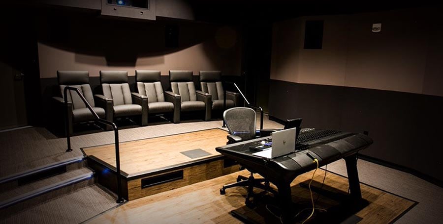 Image of small mixing room with Dolby Atmos and Pro Tools workstation