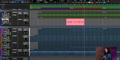 Pro Tools edit timeline with bottom right photo inlay of a girl recording vocals